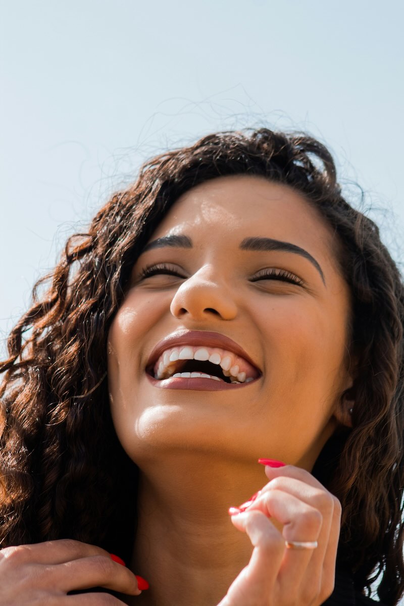 Smiling patient after a dental hygienist appointment in Truro